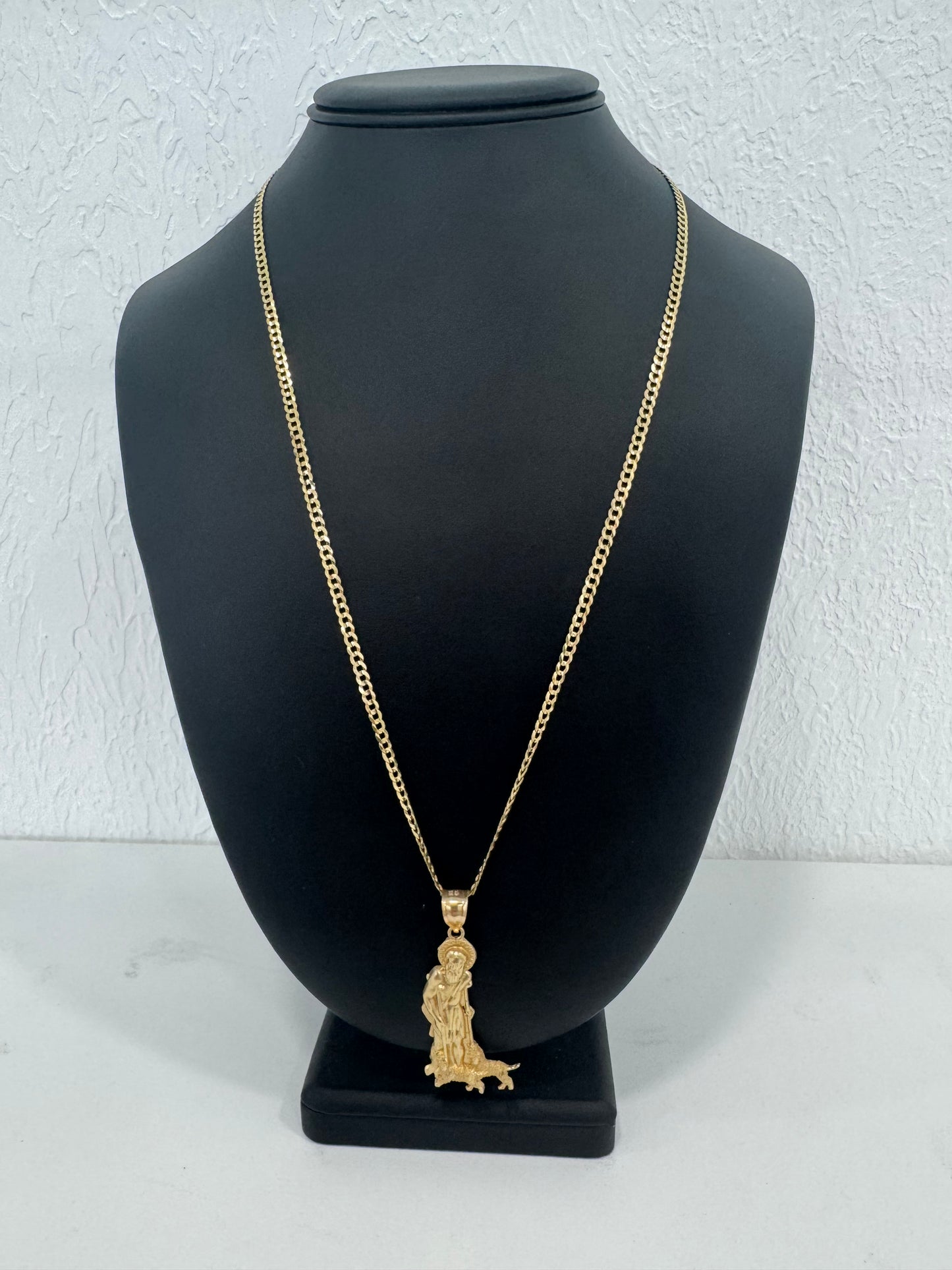 Cadena corte brillo y dije San Lázaro.